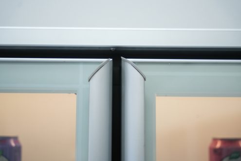 Glass door handles on a double-door display cooler